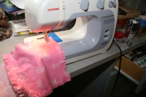 Sew blocks together with 1-inch seams, fringe on the right side